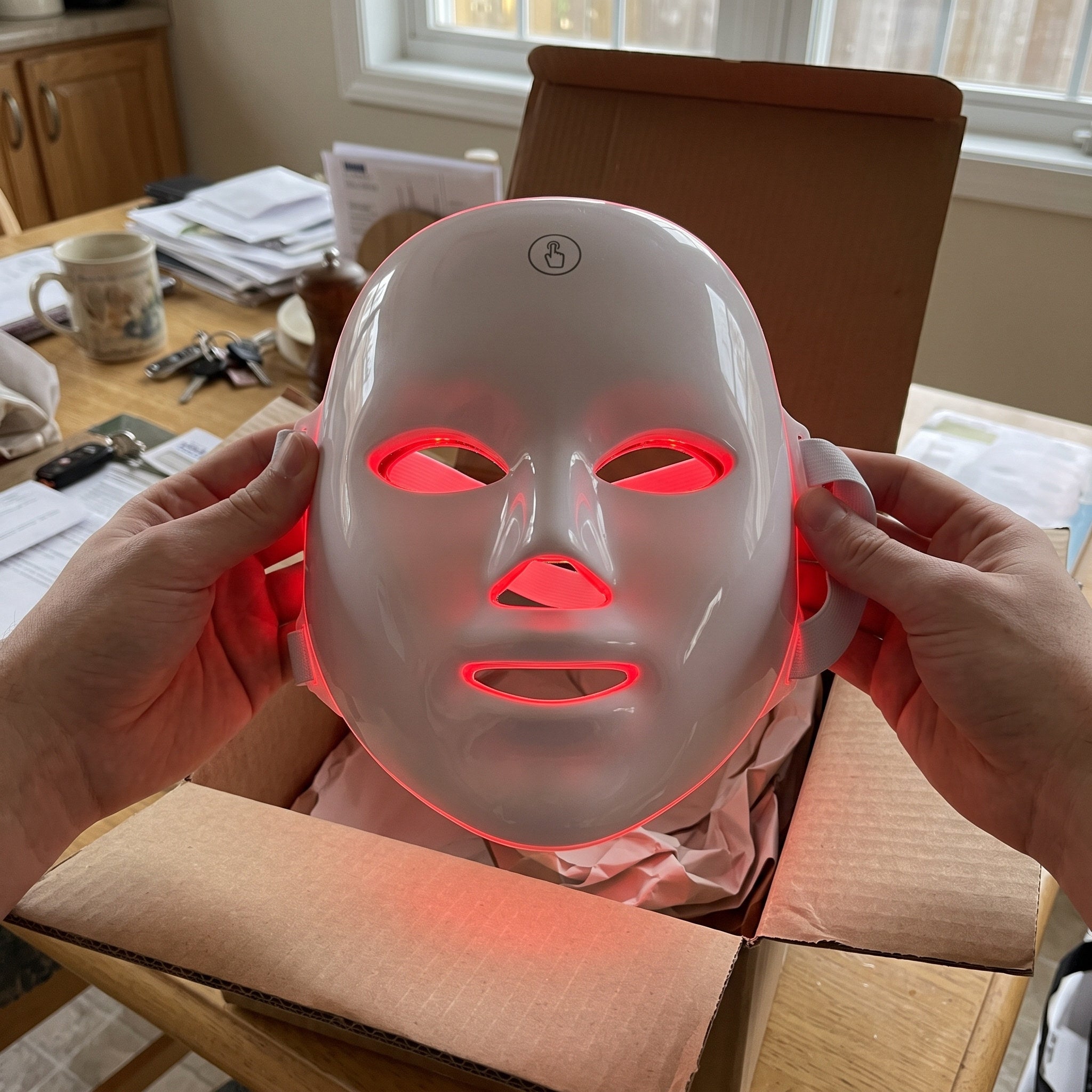 White Glow Hour LED face mask in an at-home self-care scene 7